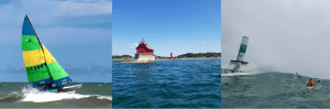 Sailboat kayakers and lighthouse on lake